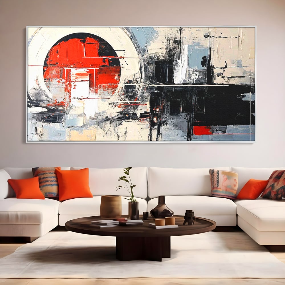 Tablou canvas cu tablou canvas cu cerc rosu si geometrie abstracta, in rama de aluminiu argintiu, pe perete intr-un living